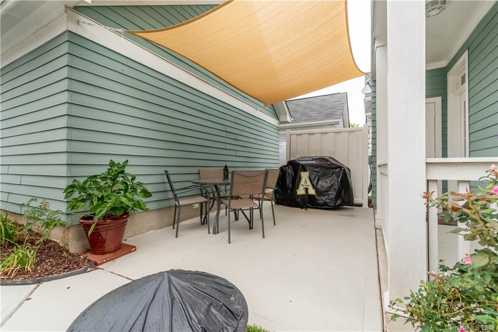 4222 Vance Road North Huntersville, NC 28078 - Photo 25 of 36 a view of backyard with a patio and plants