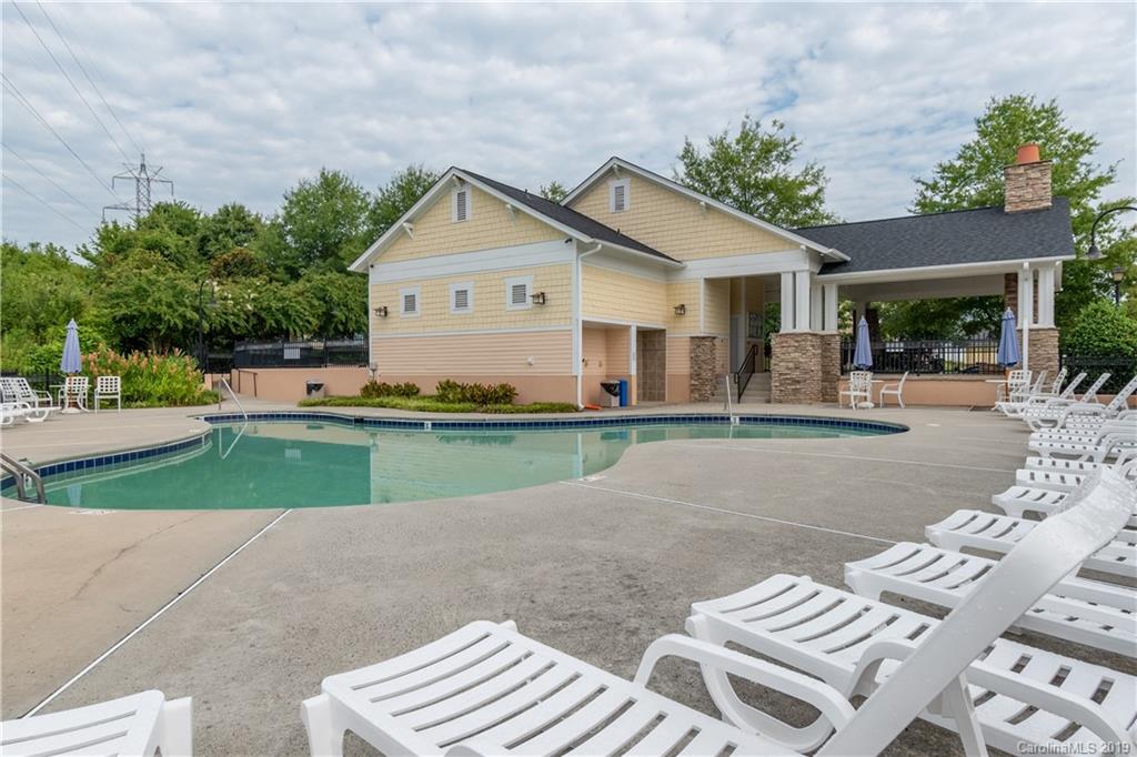 4222 Vance Road North Huntersville, NC 28078 - Photo 34 of 36 a front view of a house with a yard and potted plants