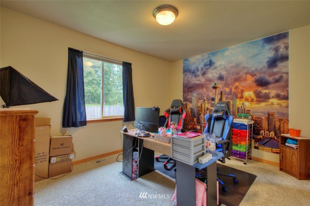 5809 Stringtown Road East Eatonville, WA 98328 - Photo 17 of 28 a view of a workspace with furniture and a window