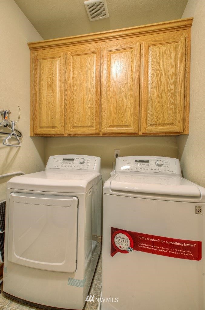 5809 Stringtown Road East Eatonville, WA 98328 - Photo 18 of 28 a utility room with dryer and washer