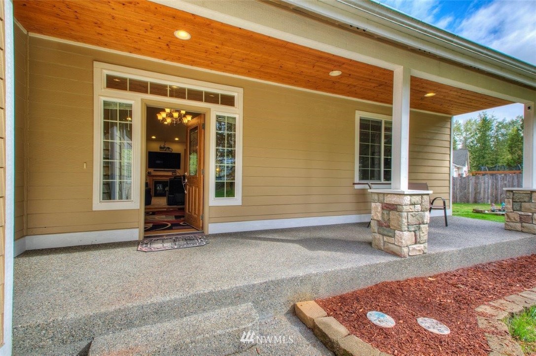 5809 Stringtown Road East Eatonville, WA 98328 - Photo 3 of 28 a view of an outdoor space with porch and patio
