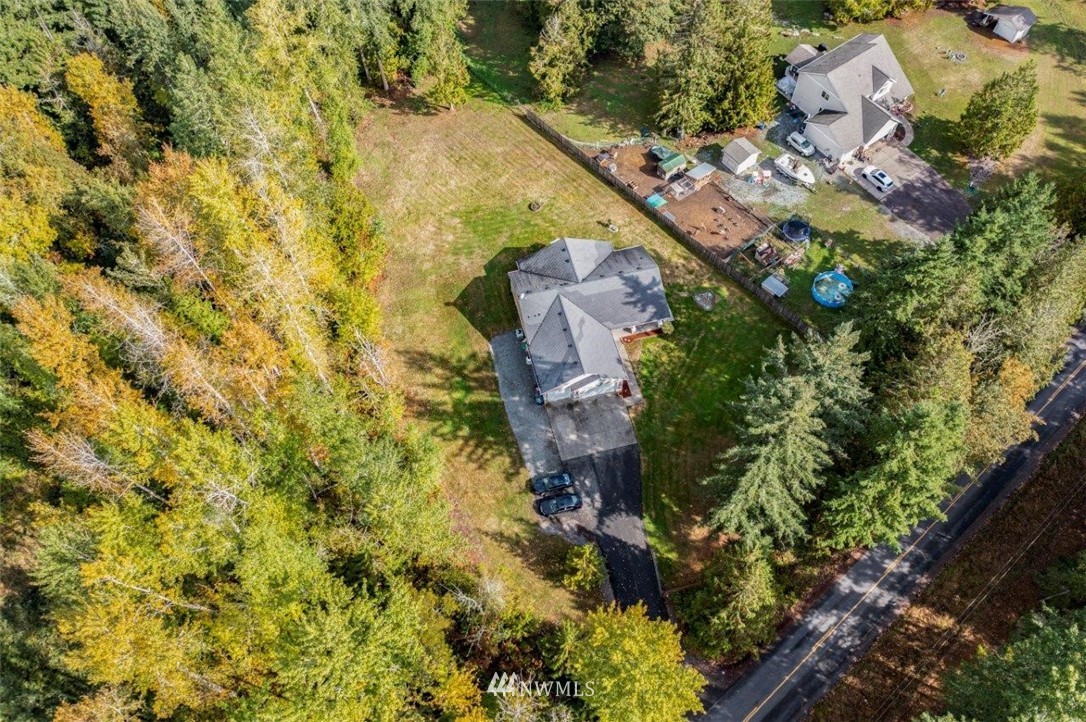 5809 Stringtown Road East Eatonville, WA 98328 - Photo 25 of 28 an aerial view of residential houses with outdoor space