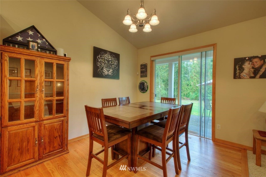 5809 Stringtown Road East Eatonville, WA 98328 - Photo 7 of 28 a view of a dining room with furniture window and outside view