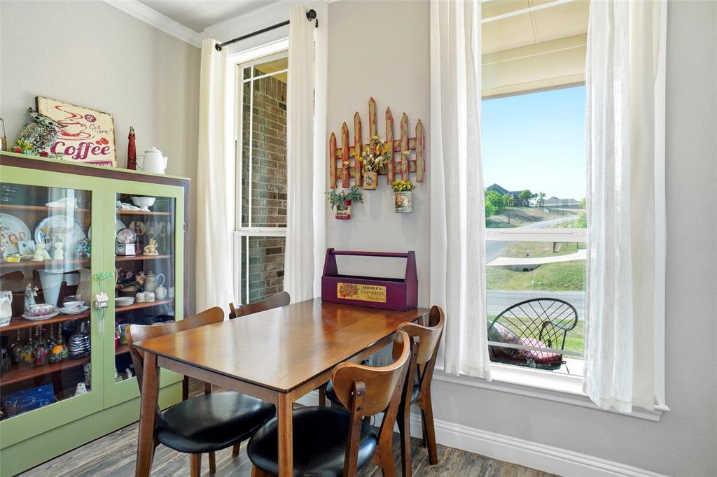 1024 Tex Lane Springtown, TX 76082 - Photo 18 of 40 a view of a dining room with furniture and a window