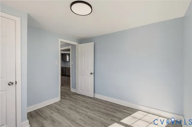 a view of an empty room and window