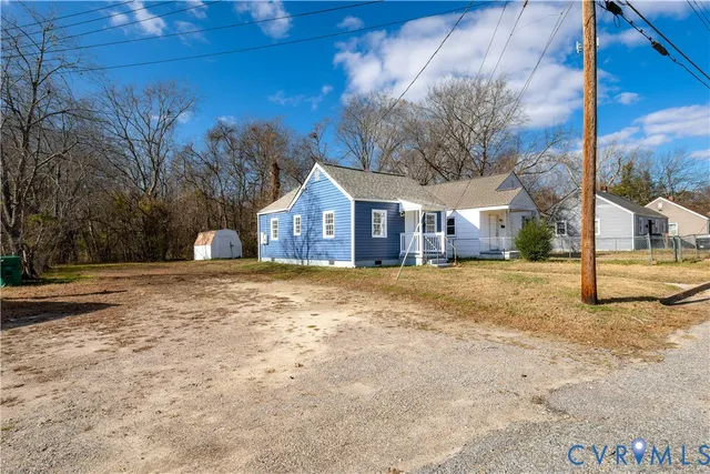 a house with trees in front of it