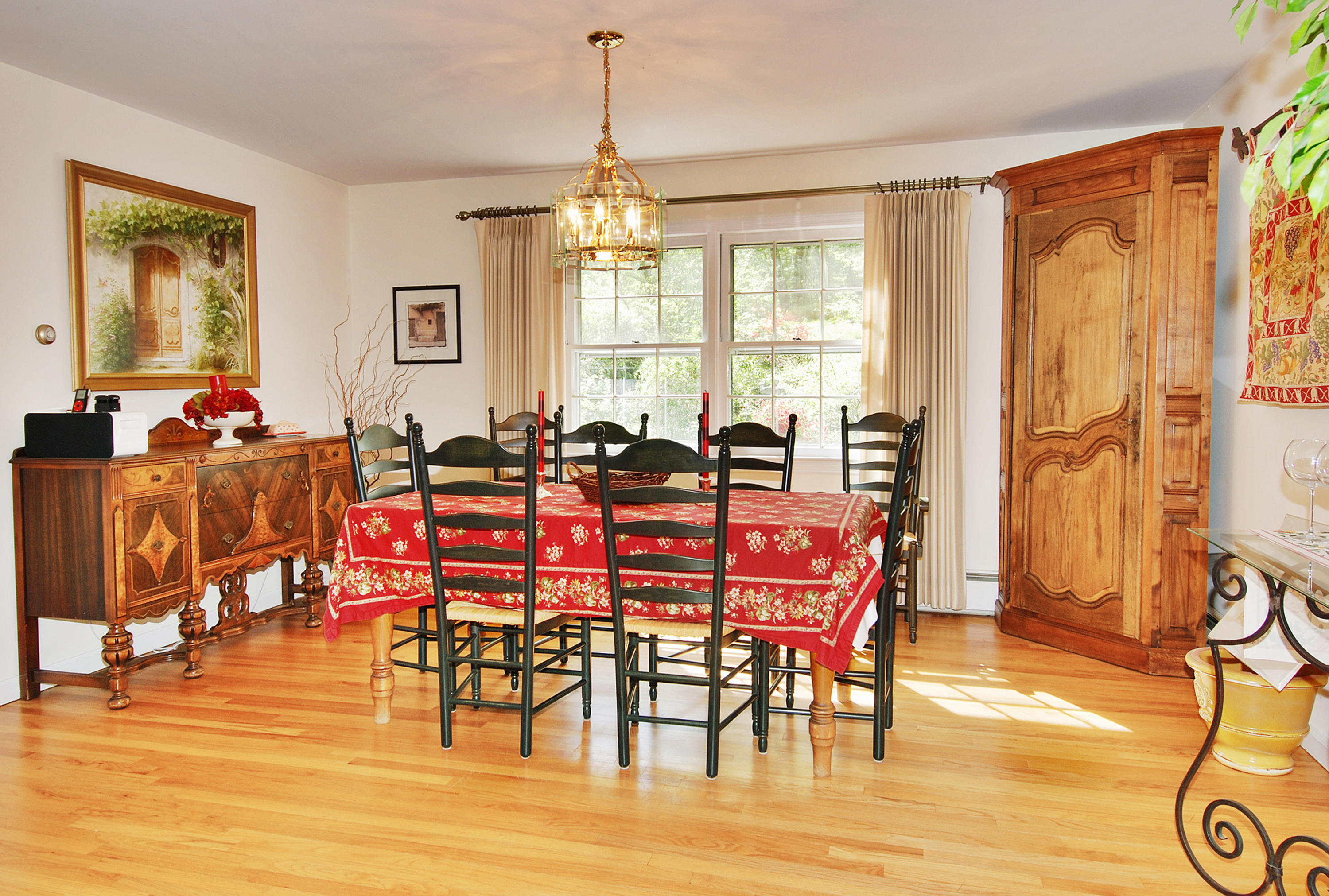 154 South Bald Hill Road New Canaan, CT 06840 - Photo 6 of 21 a view of a dining room and livingroom with furniture window and wooden floor
