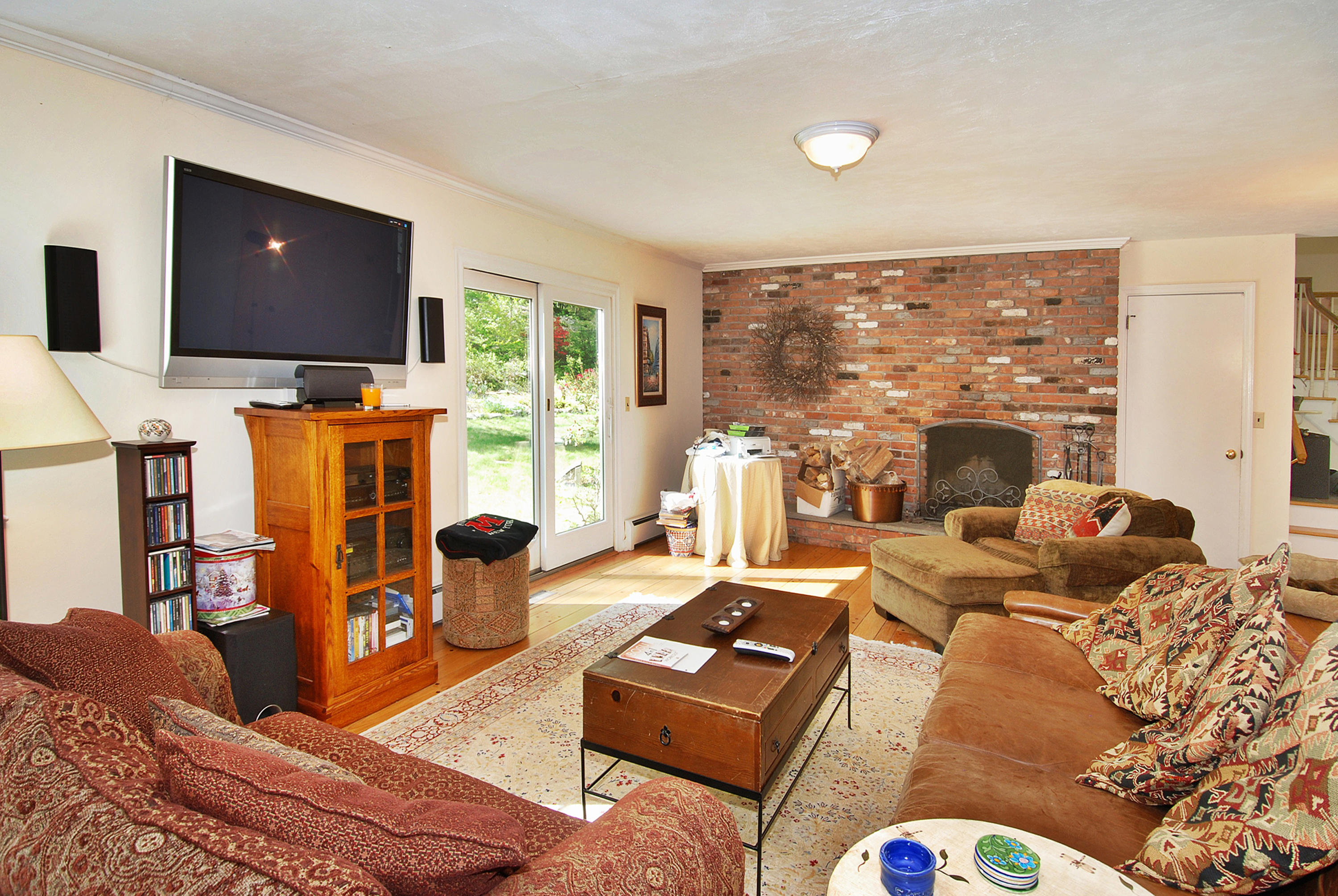 154 South Bald Hill Road New Canaan, CT 06840 - Photo 10 of 21 a living room with furniture and a flat screen tv
