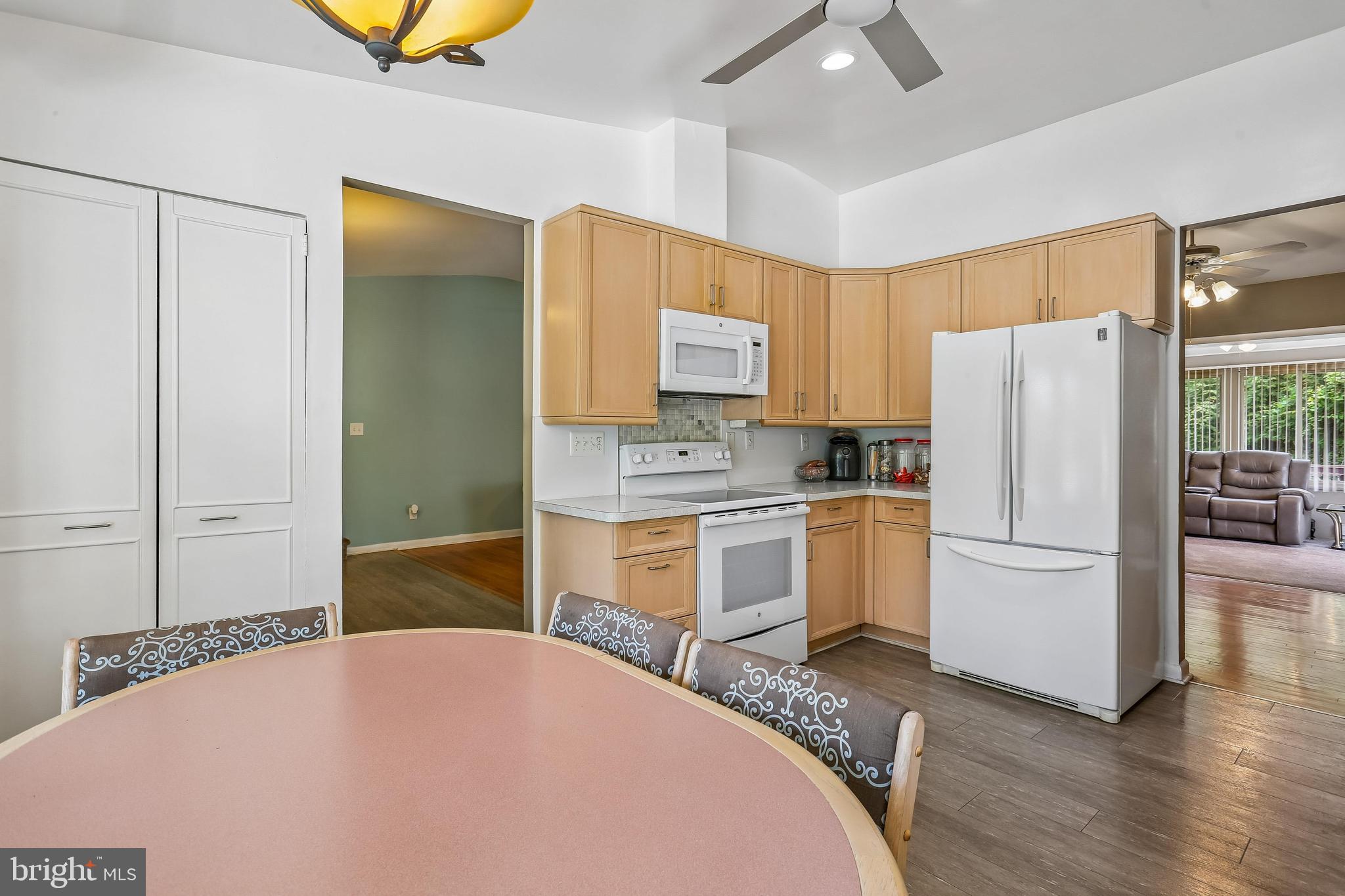 2 Foxhall Court Silver Spring, MD 20906 - Photo 21 of 86 a kitchen with a refrigerator and a stove top oven