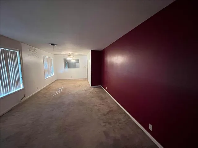 a view of hallway with natural light