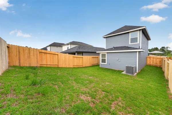 a view of a backyard with a garden