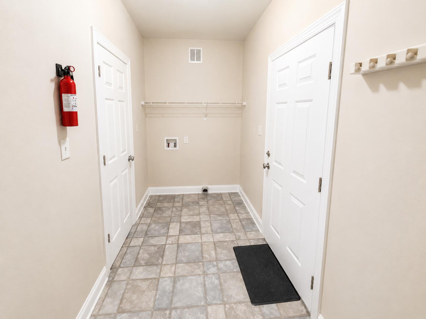 147 Dover Lane Freeport, FL 32439 - Photo 19 of 27 a view of a hallway with white walls