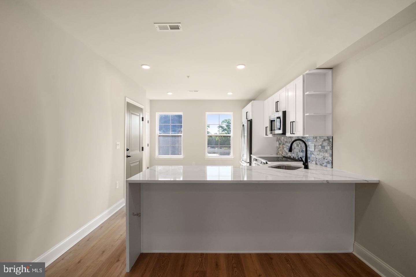 2709 Priya, Unit A76 Philadelphia, PA 19131 - Photo 5 of 29 Modern kitchen with sleek finishes.