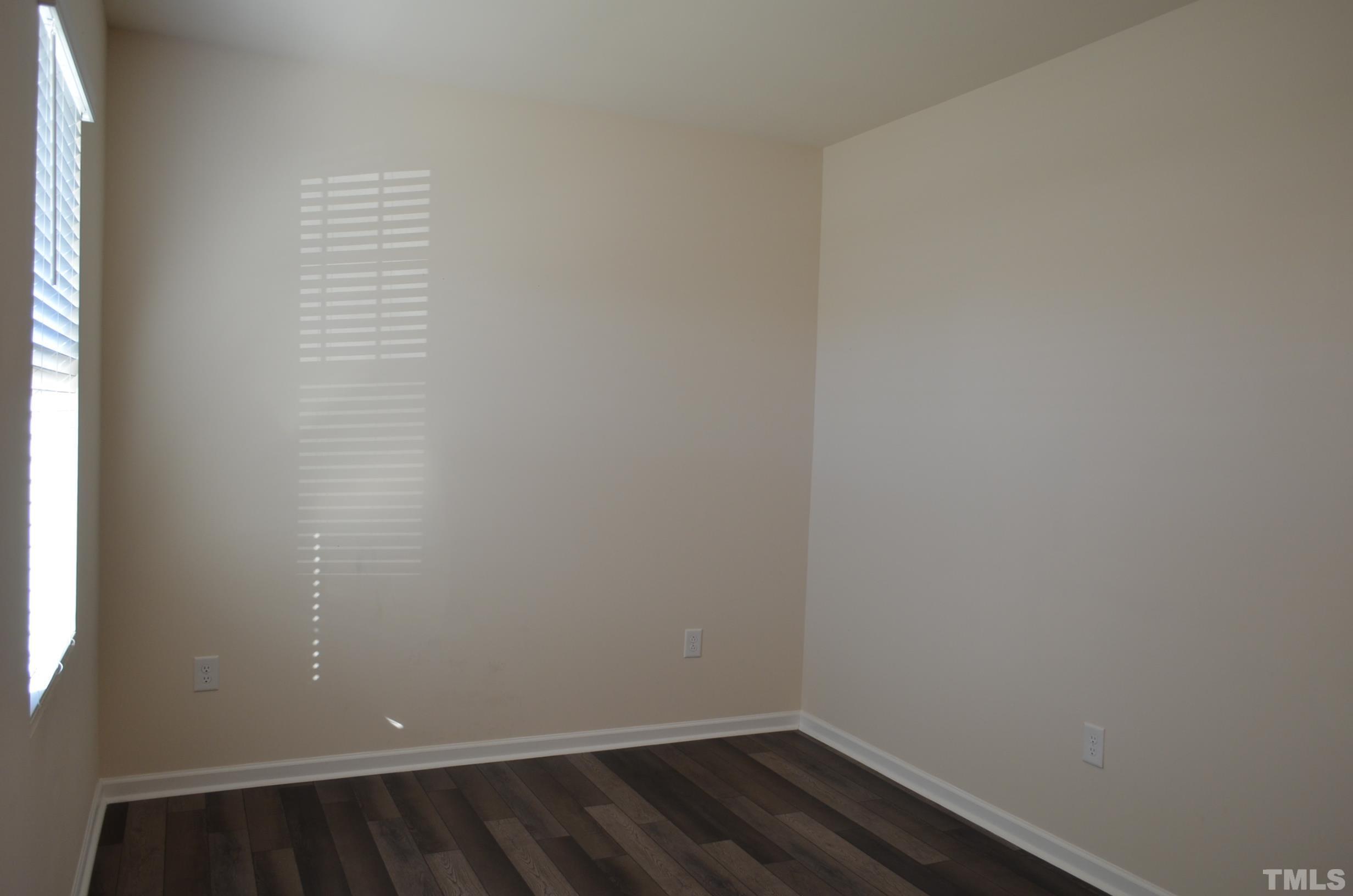 3537 Pinnacle Peak Drive Raleigh, NC 27604 - Photo 12 of 41 a view of a small space with wooden floor and a window