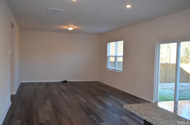 a hallway with wooden floor
