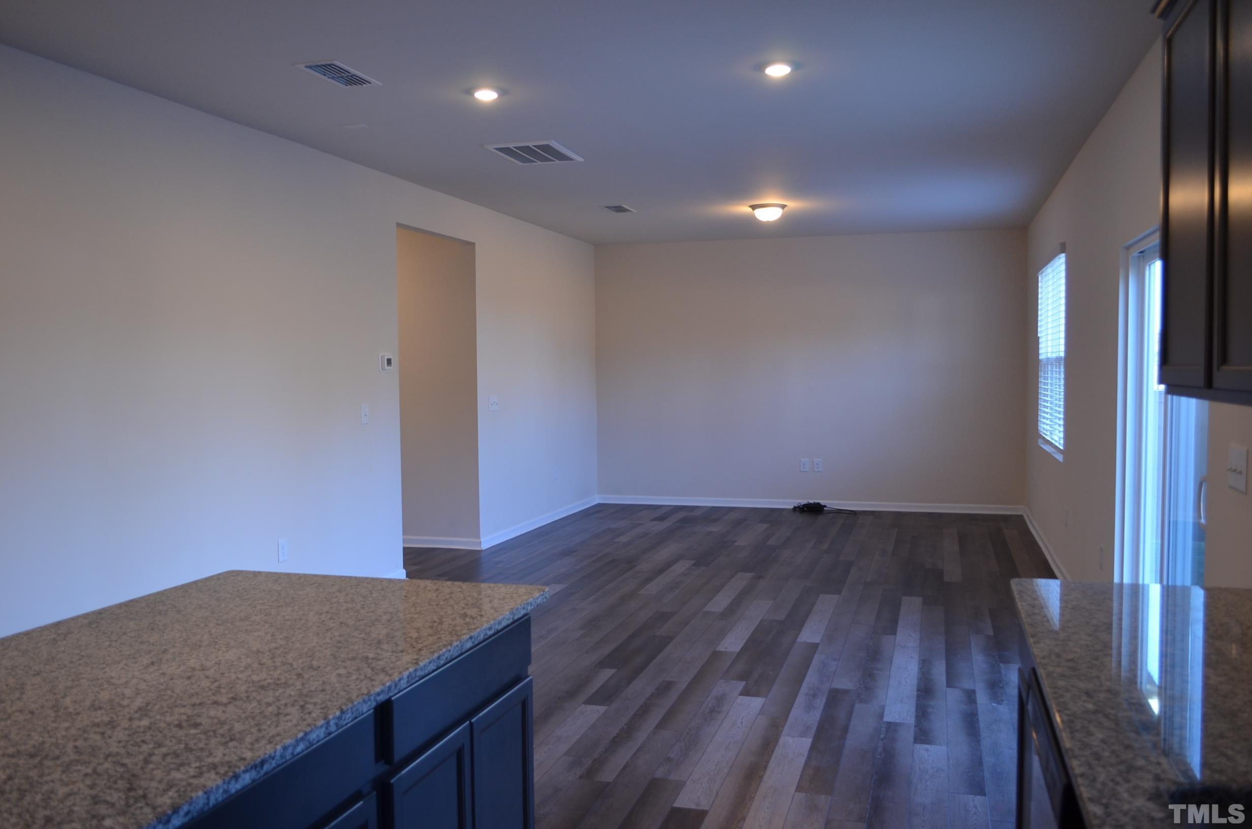 3537 Pinnacle Peak Drive Raleigh, NC 27604 - Photo 17 of 41 a hallway with wooden floor
