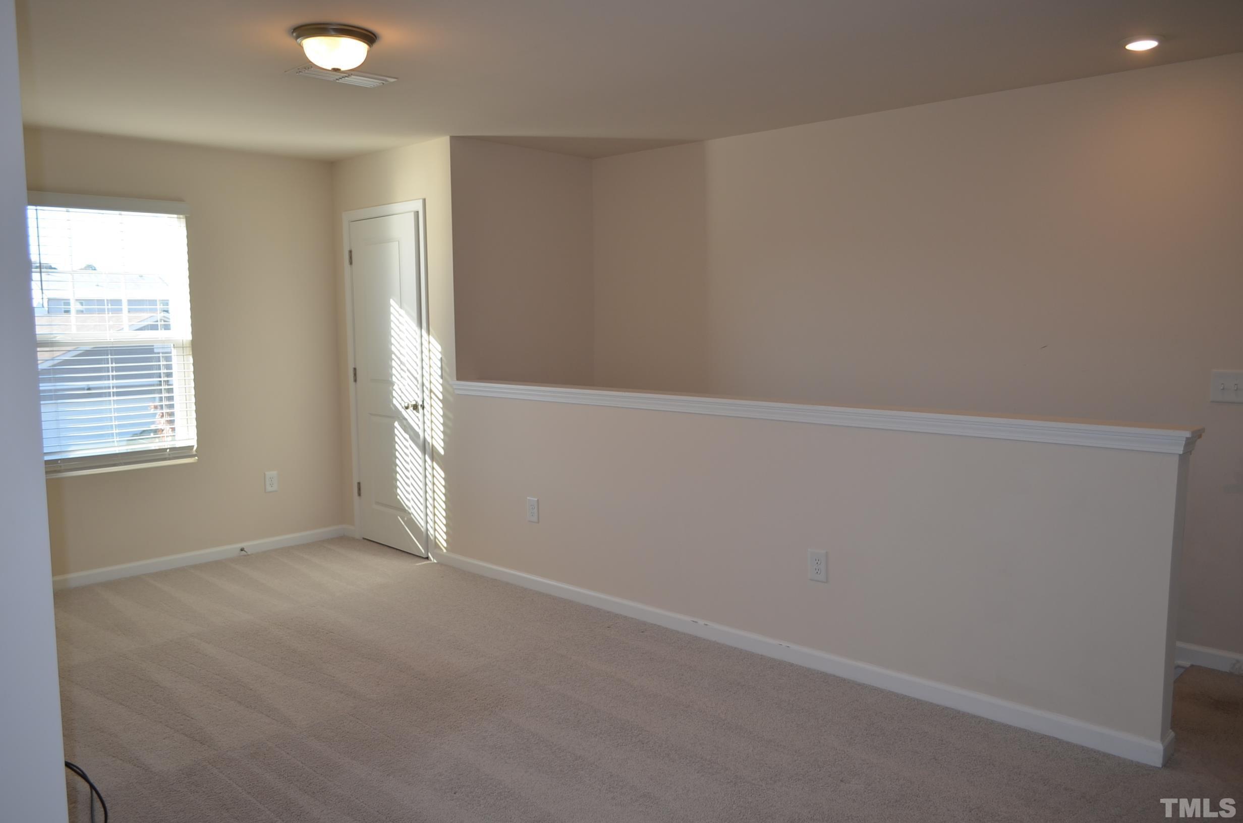 3537 Pinnacle Peak Drive Raleigh, NC 27604 - Photo 23 of 41 an empty room with windows