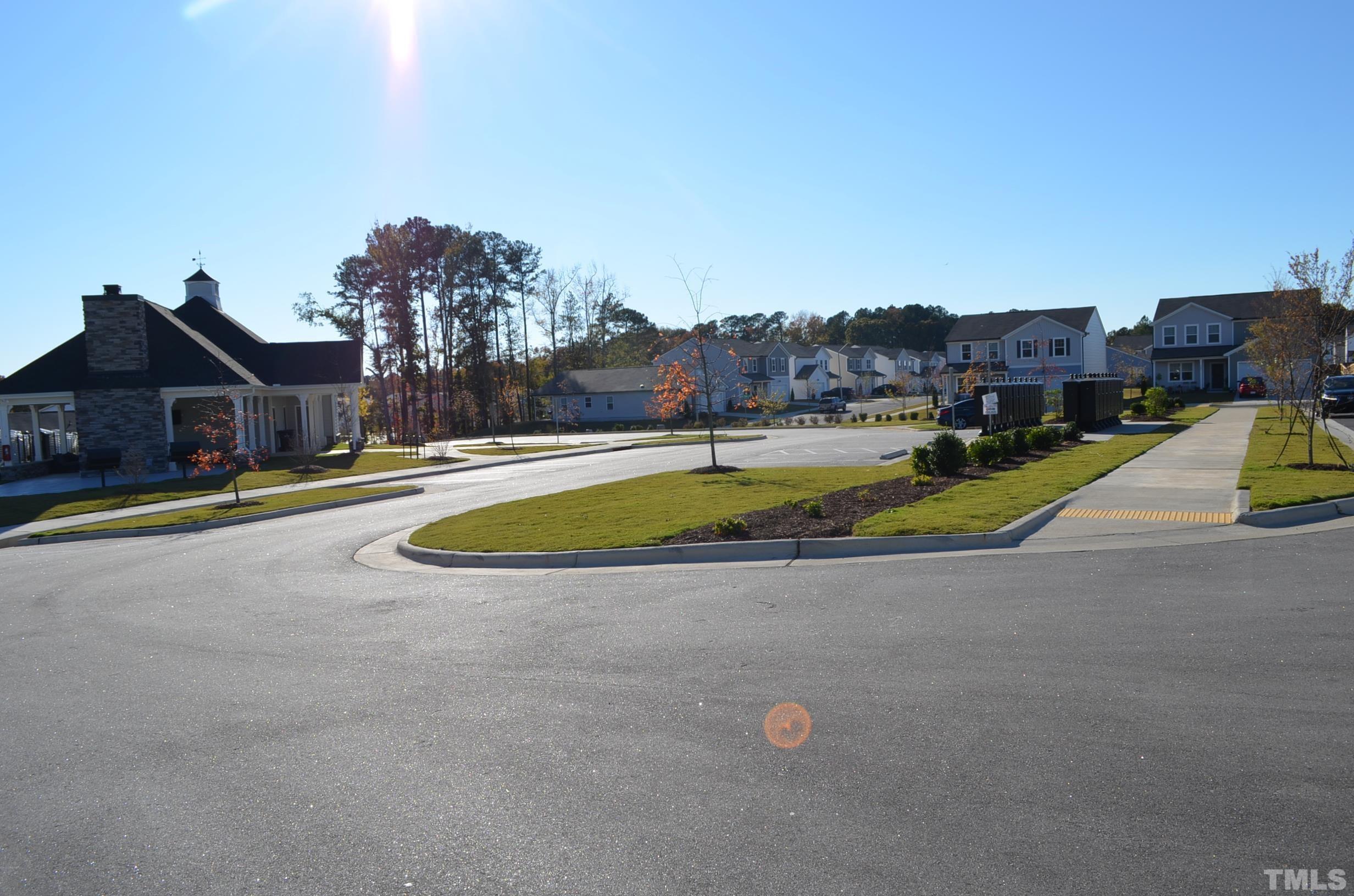 3537 Pinnacle Peak Drive Raleigh, NC 27604 - Photo 38 of 41 a view of a swimming pool with a yard and a large tree
