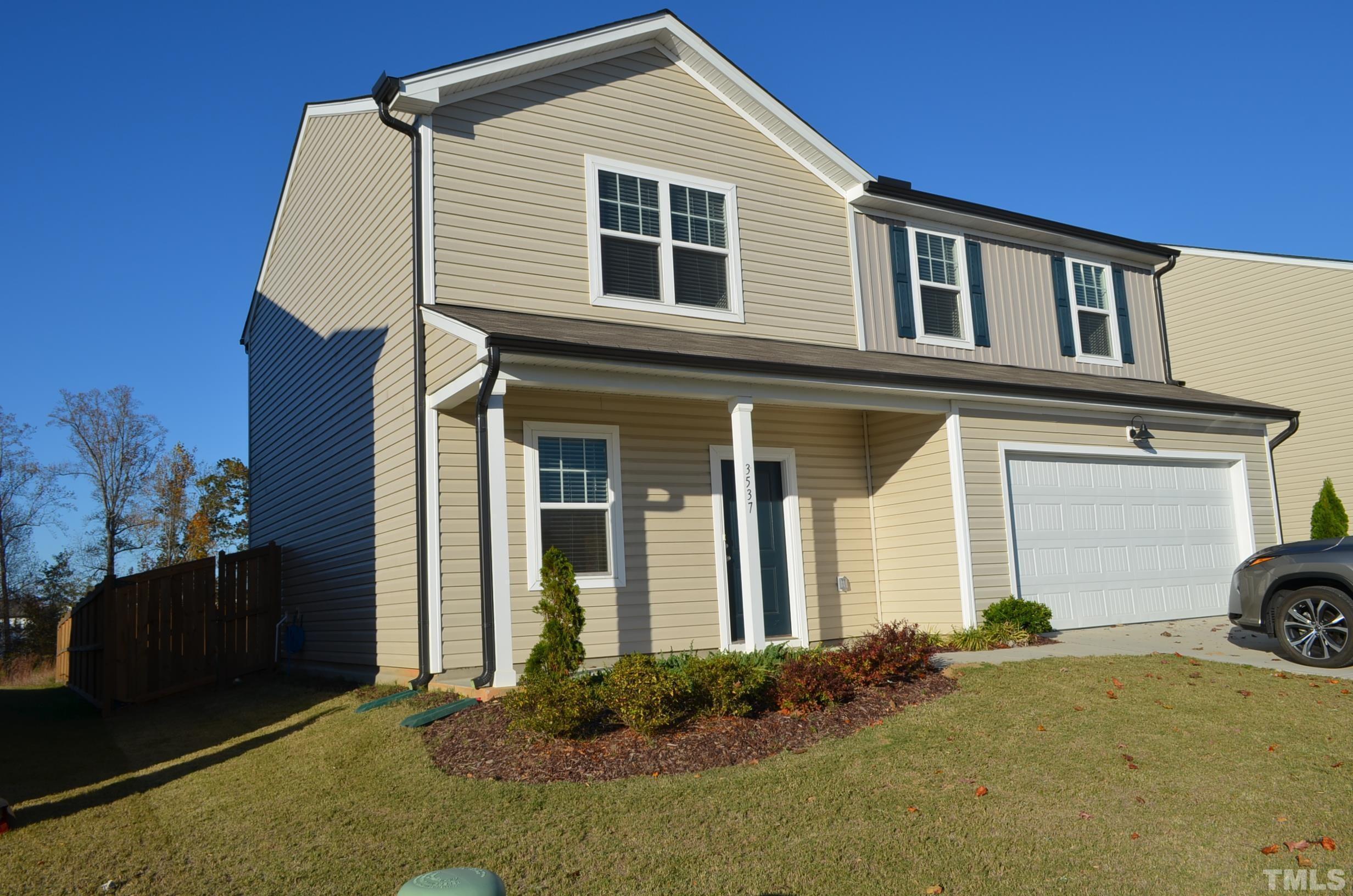 3537 Pinnacle Peak Drive Raleigh, NC 27604 - Photo 4 of 41 a front view of a house with a yard