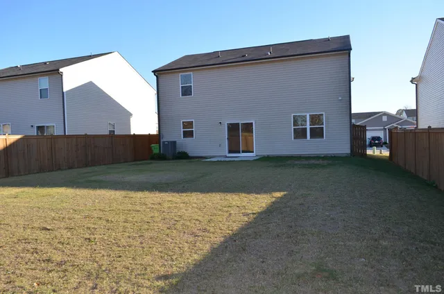 a house view with a backyard
