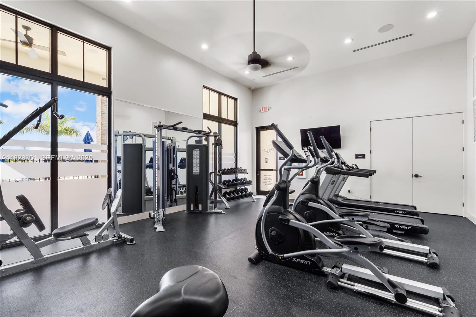 9917 Southwest 228th Terrace Miami, FL 33190 - Photo 20 of 36 a view of a room with gym equipment