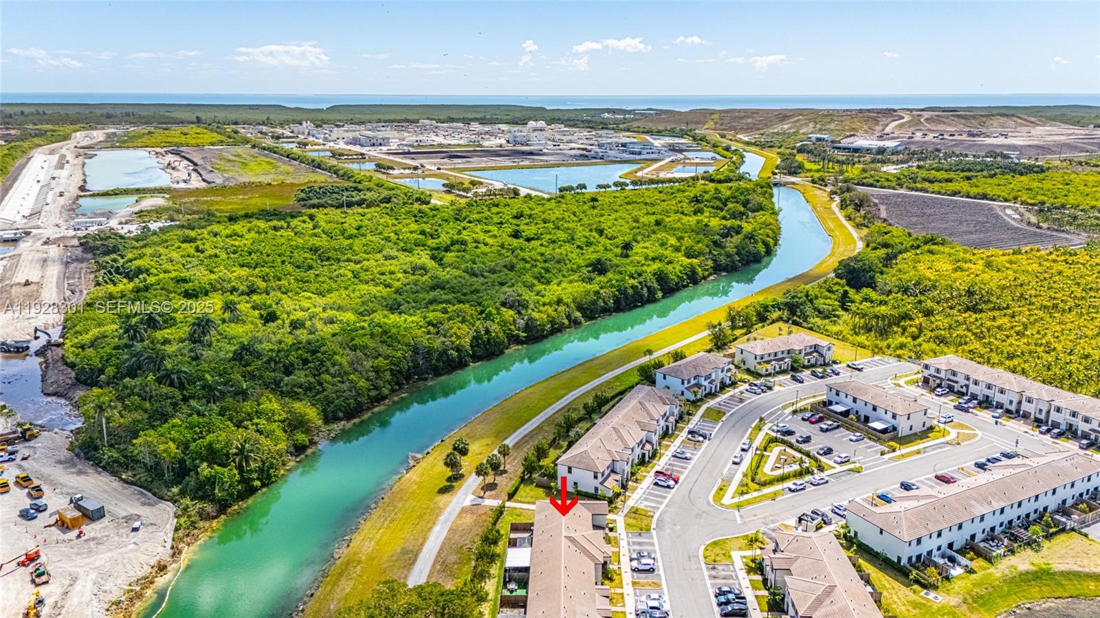 9917 Southwest 228th Terrace Miami, FL 33190 - Photo 21 of 36 a view of an ocean and beach