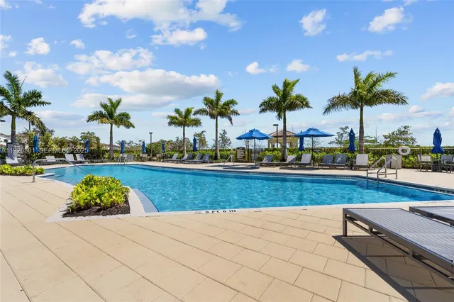 a view of outdoor space with swimming pool