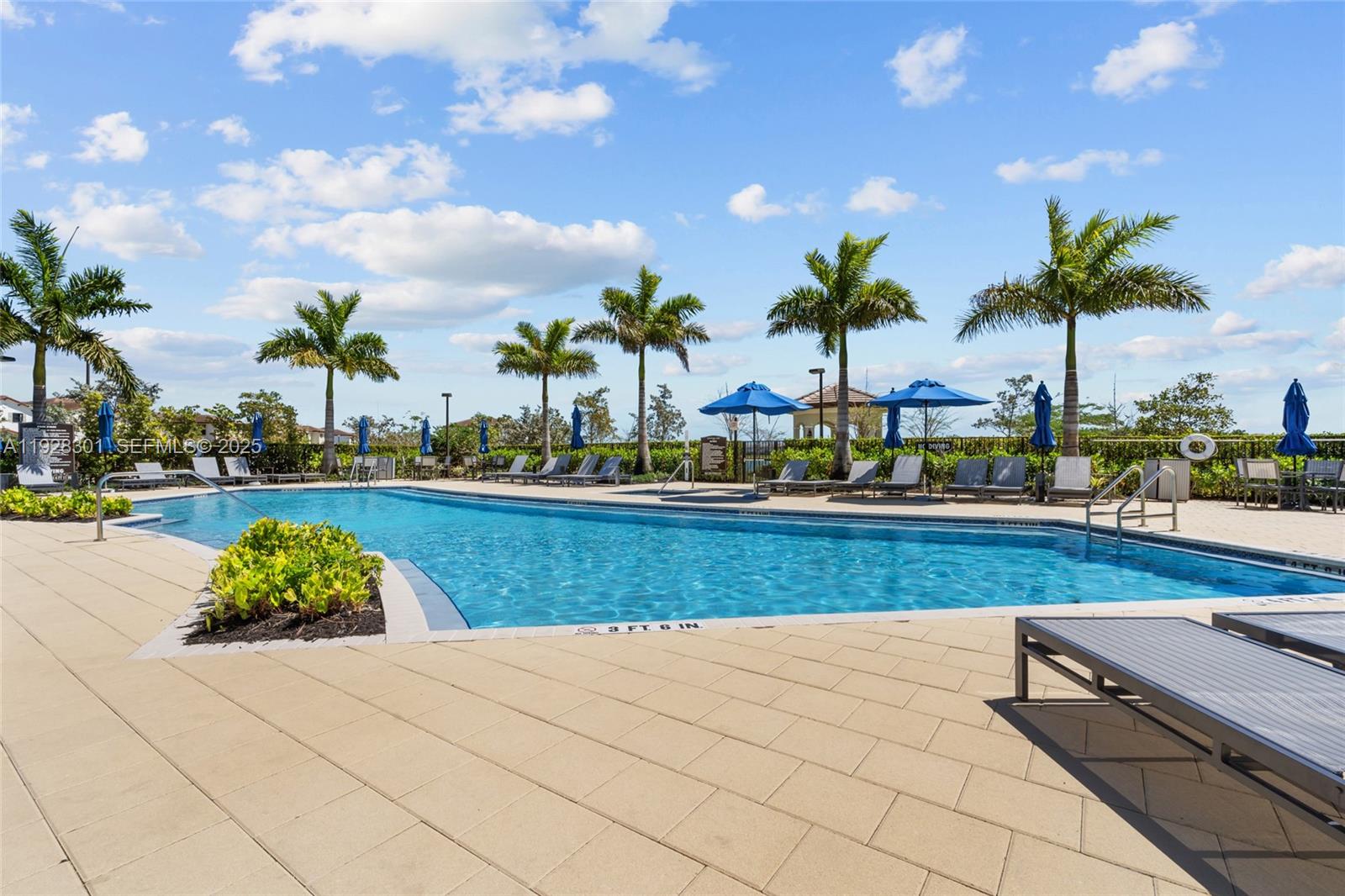 9917 Southwest 228th Terrace Miami, FL 33190 - Photo 5 of 36 a view of outdoor space with swimming pool