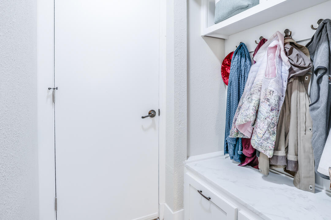 4306 57th Street Lubbock, TX 79413 - Photo 15 of 23 a view of walk in closet with clothes