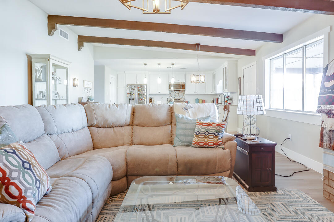 4306 57th Street Lubbock, TX 79413 - Photo 17 of 23 a living room with furniture and a large window