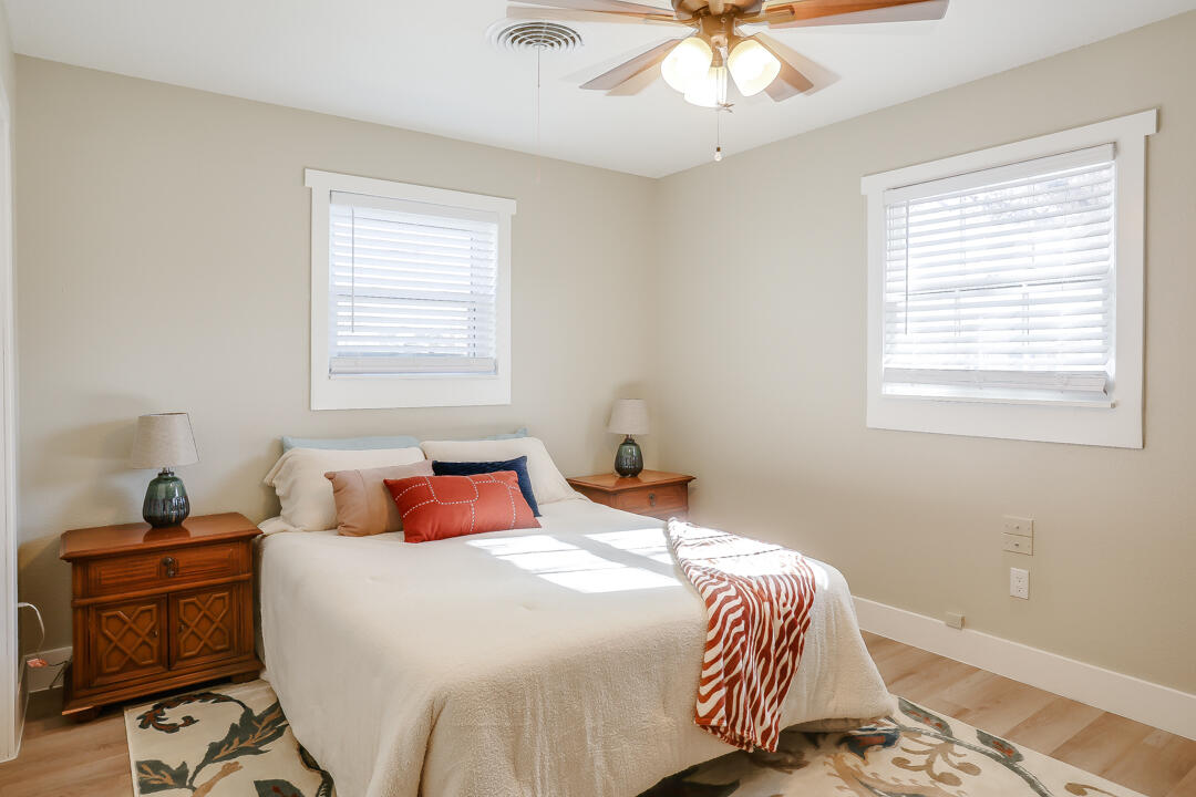 4306 57th Street Lubbock, TX 79413 - Photo 5 of 23 a bedroom with a bed and a window