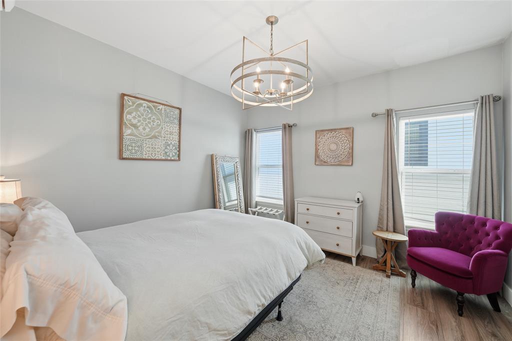 708 South 9th Street Waco, TX 76706 - Photo 16 of 26 a bedroom with a bed and a couch