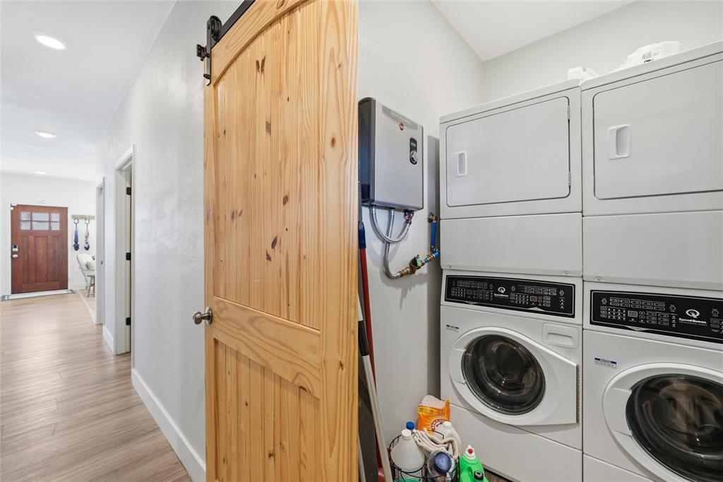 708 South 9th Street Waco, TX 76706 - Photo 19 of 26 a view of a hallway with washer and dryer
