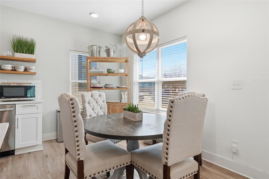 708 South 9th Street Waco, TX 76706 - Photo 8 of 26 a view of a dining room with furniture window and wooden floor