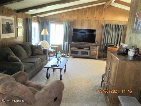 861 Hinman Road Harrah, WA 98933 - Photo 2 of 23 a living room with furniture and a flat screen tv