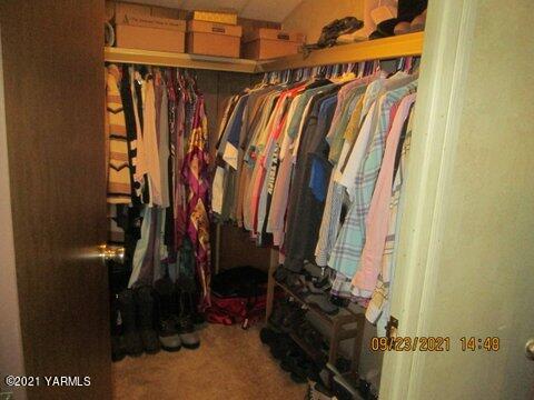 861 Hinman Road Harrah, WA 98933 - Photo 10 of 23 a view of walk in closet with clothes