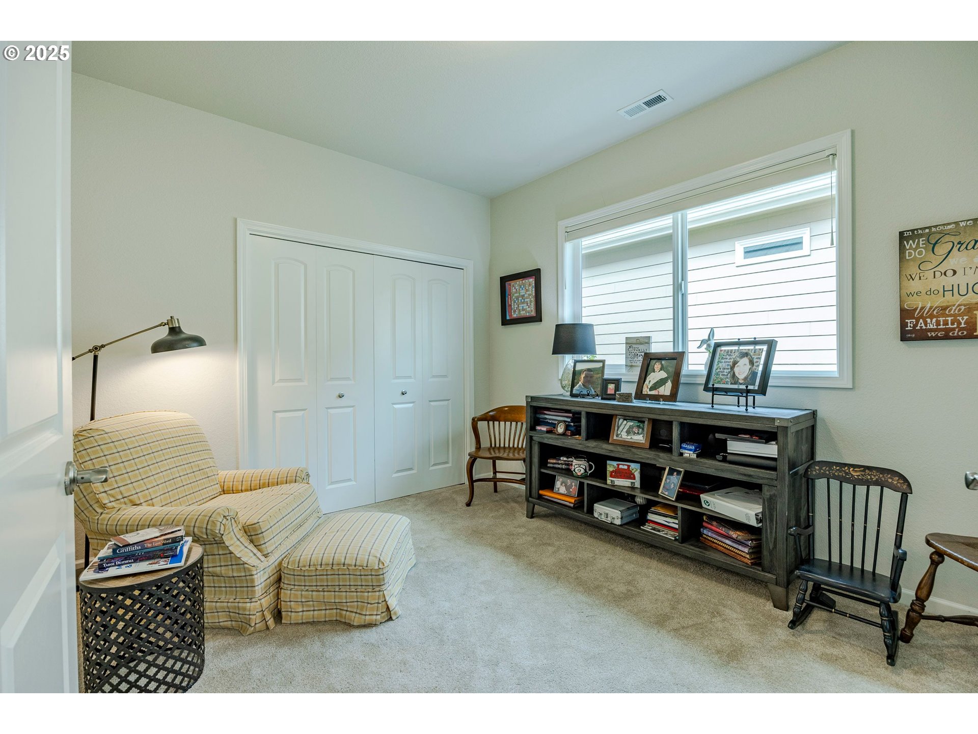 2024 Lake Shore Drive Eugene, OR 97408 - Photo 14 of 34 a bedroom with furniture and a lamp