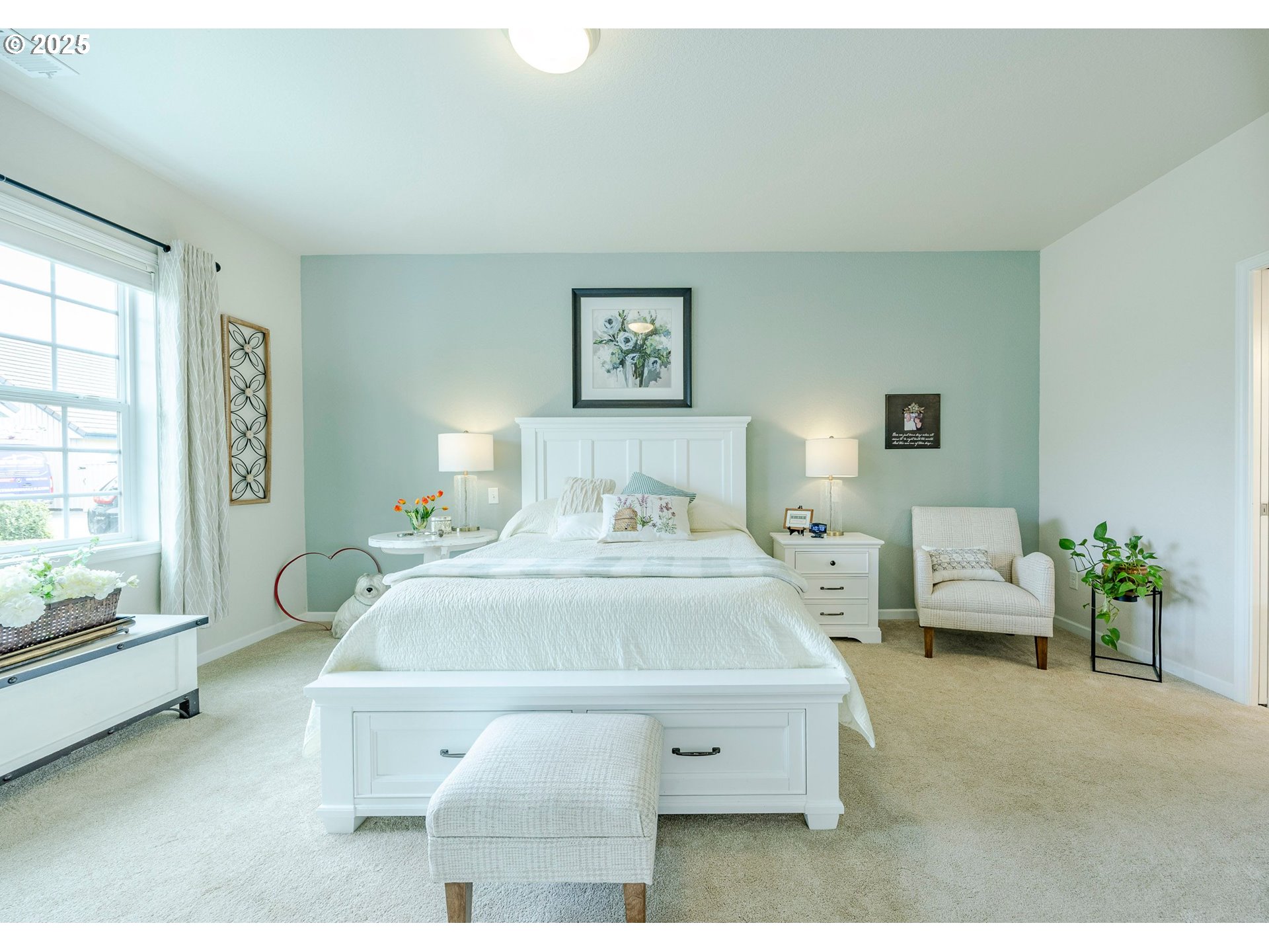 2024 Lake Shore Drive Eugene, OR 97408 - Photo 15 of 34 a spacious bedroom with a bed and a couch