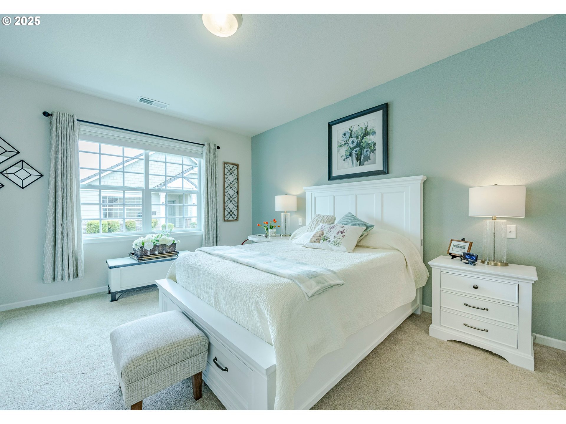 2024 Lake Shore Drive Eugene, OR 97408 - Photo 16 of 34 a bedroom with a bed and a couch