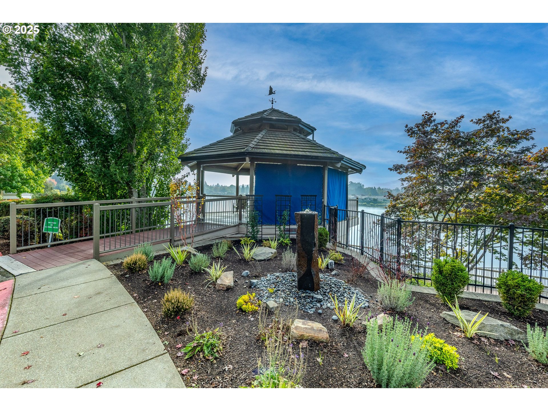 2024 Lake Shore Drive Eugene, OR 97408 - Photo 30 of 34 a front view of a house with a garden
