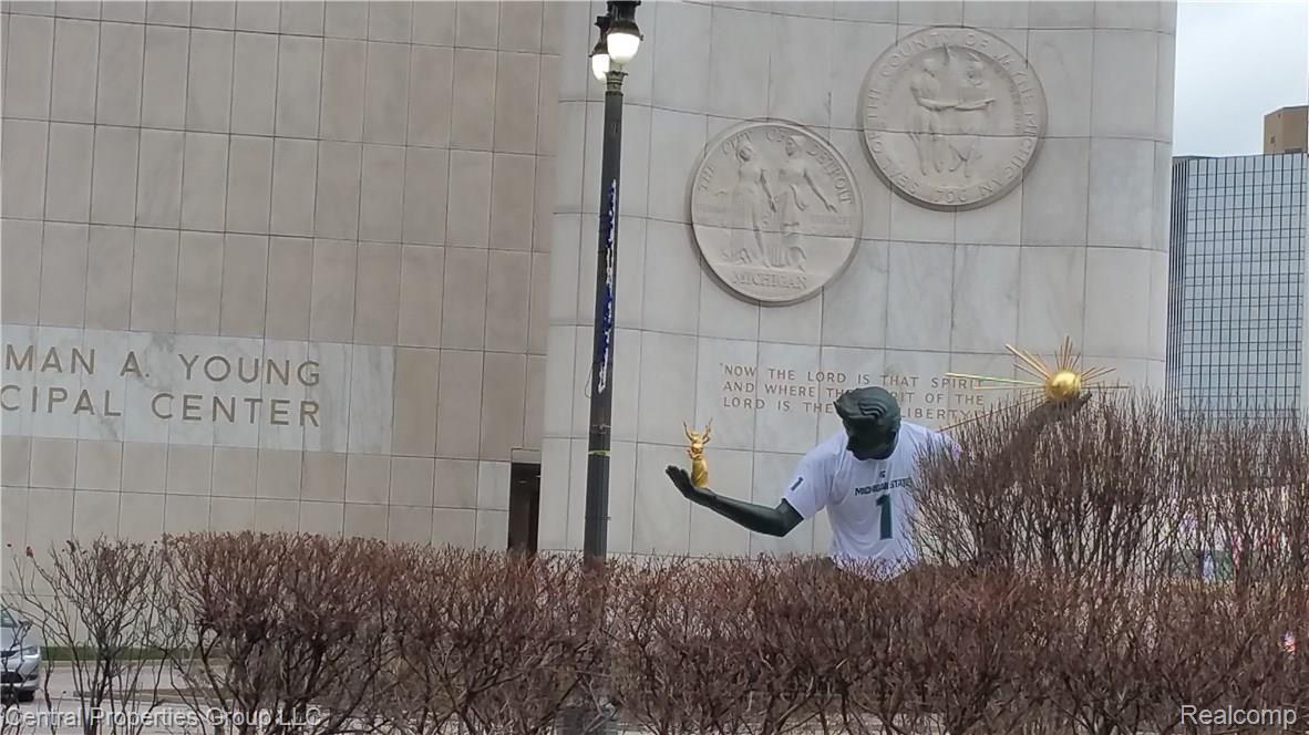 1244 Labrosse Street, Unit 2 Detroit, MI 48226 - Photo 22 of 23 Coleman A Young Building with the Giant Statue of the Detroit Man Wearing the Michigan State Color