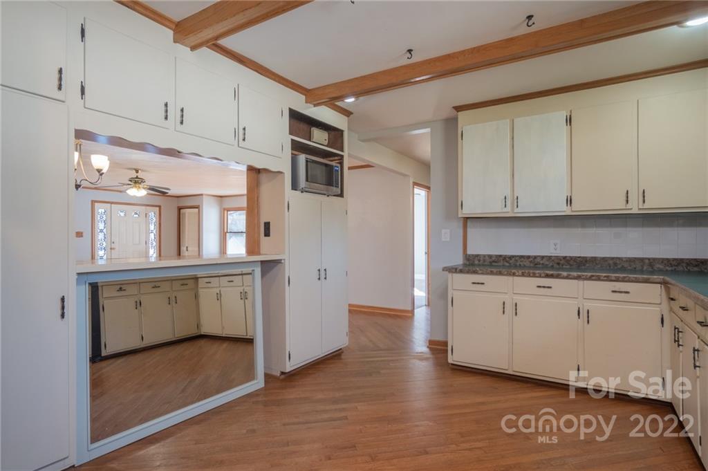 2501 Whitley Road Fort Mill, SC 29708 - Photo 11 of 46 a kitchen with granite countertop a stove a sink and a refrigerator