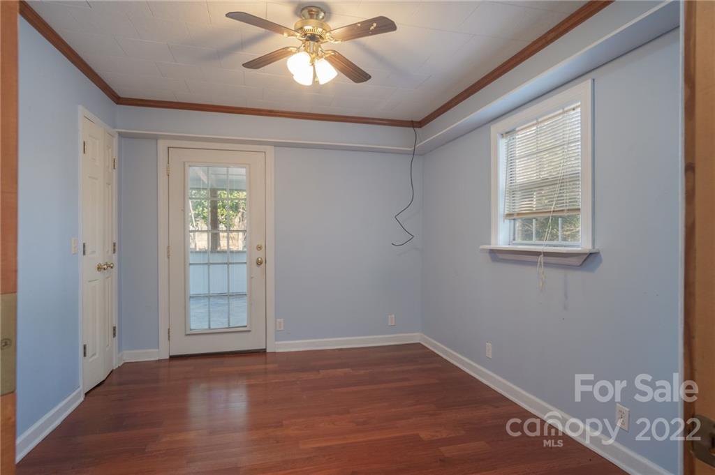 2501 Whitley Road Fort Mill, SC 29708 - Photo 23 of 46 an empty room with wooden floor closet and windows