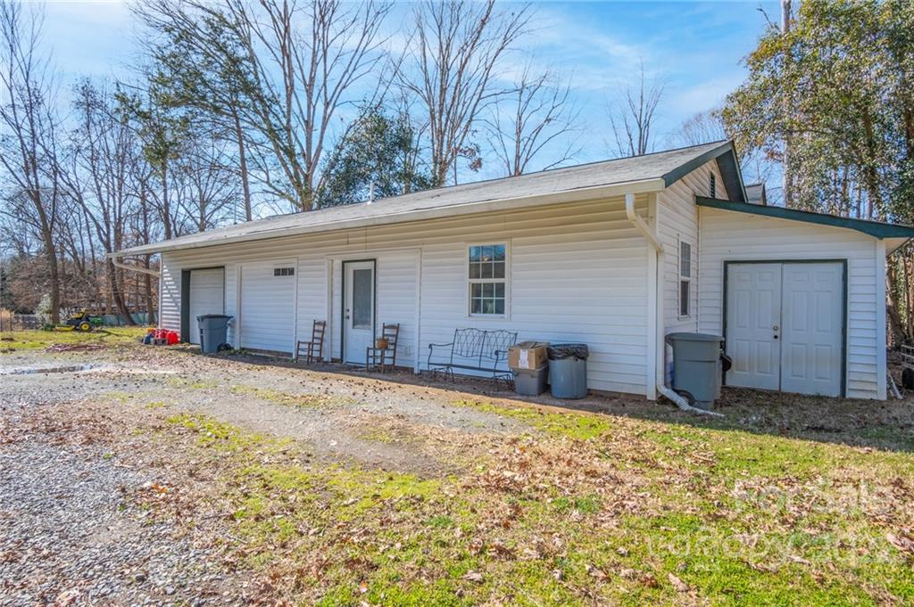 2501 Whitley Road Fort Mill, SC 29708 - Photo 30 of 46 a view of a house with a yard and garage