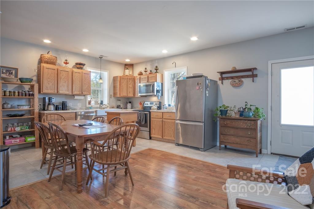 2501 Whitley Road Fort Mill, SC 29708 - Photo 35 of 46 a kitchen with stainless steel appliances granite countertop a refrigerator and a stove top oven
