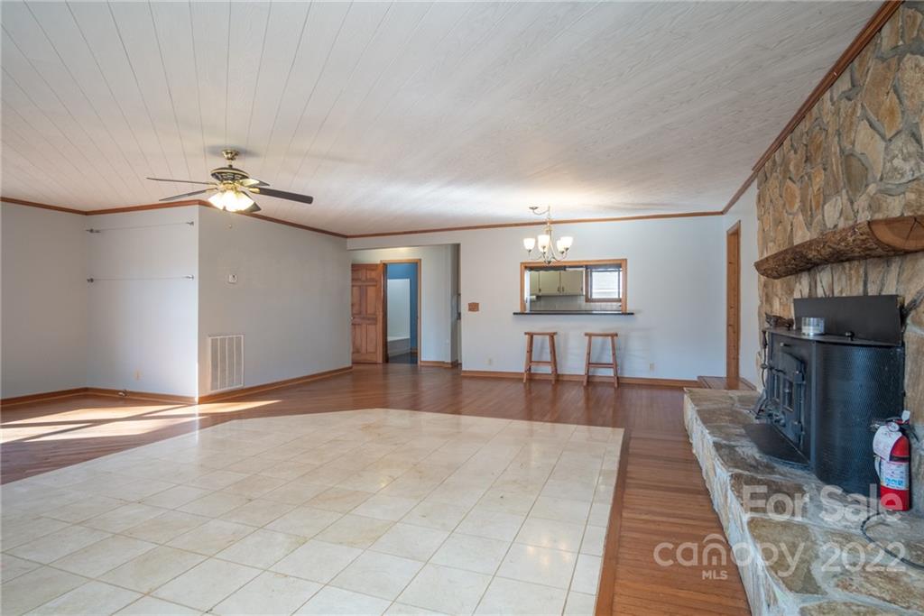 2501 Whitley Road Fort Mill, SC 29708 - Photo 9 of 46 a view of a livingroom with furniture a ceiling fan and window