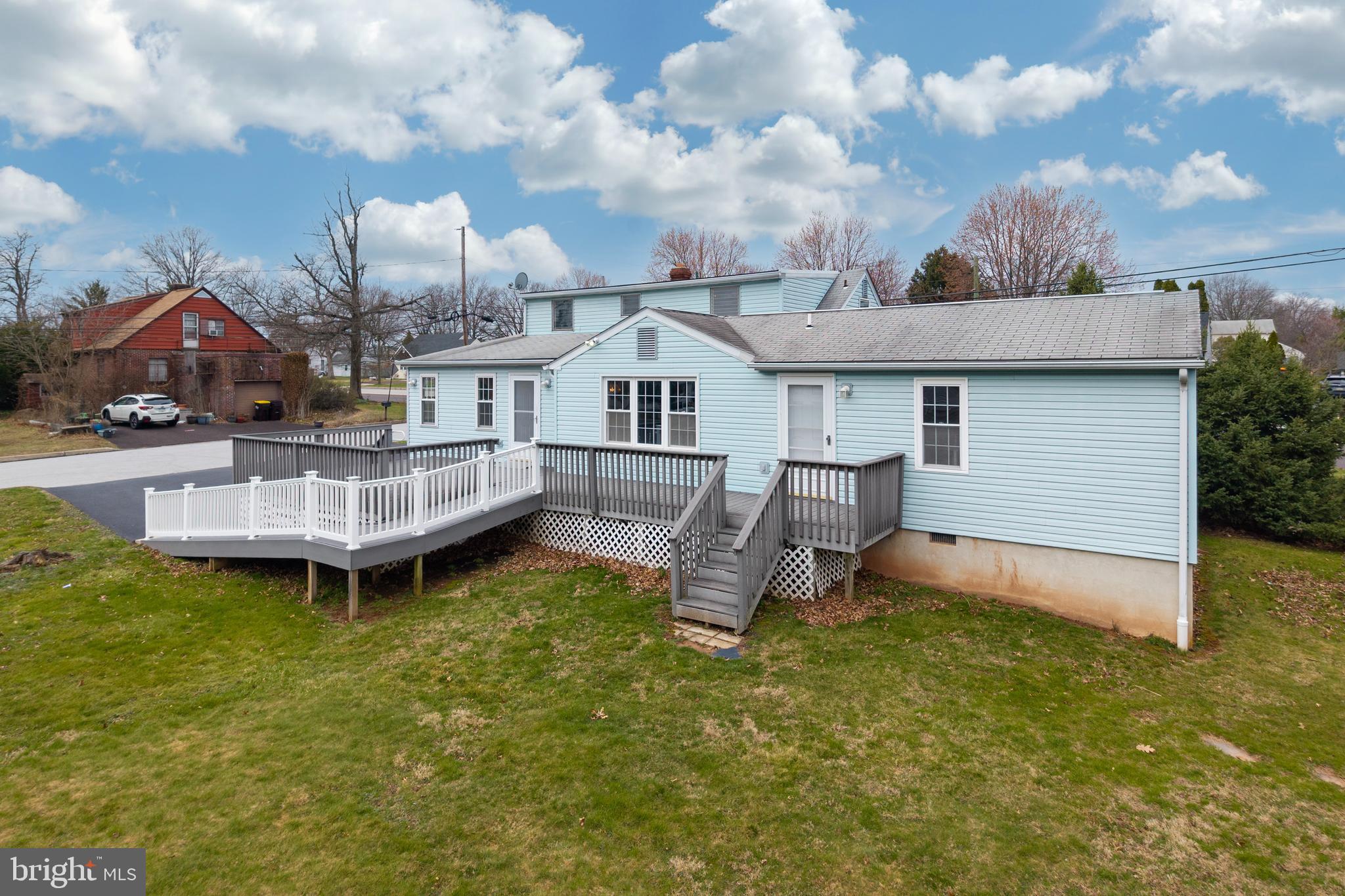 933 Forty Foot Road Hatfield, PA 19440 - Photo 22 of 28 a view of a house with a big yard and sitting area