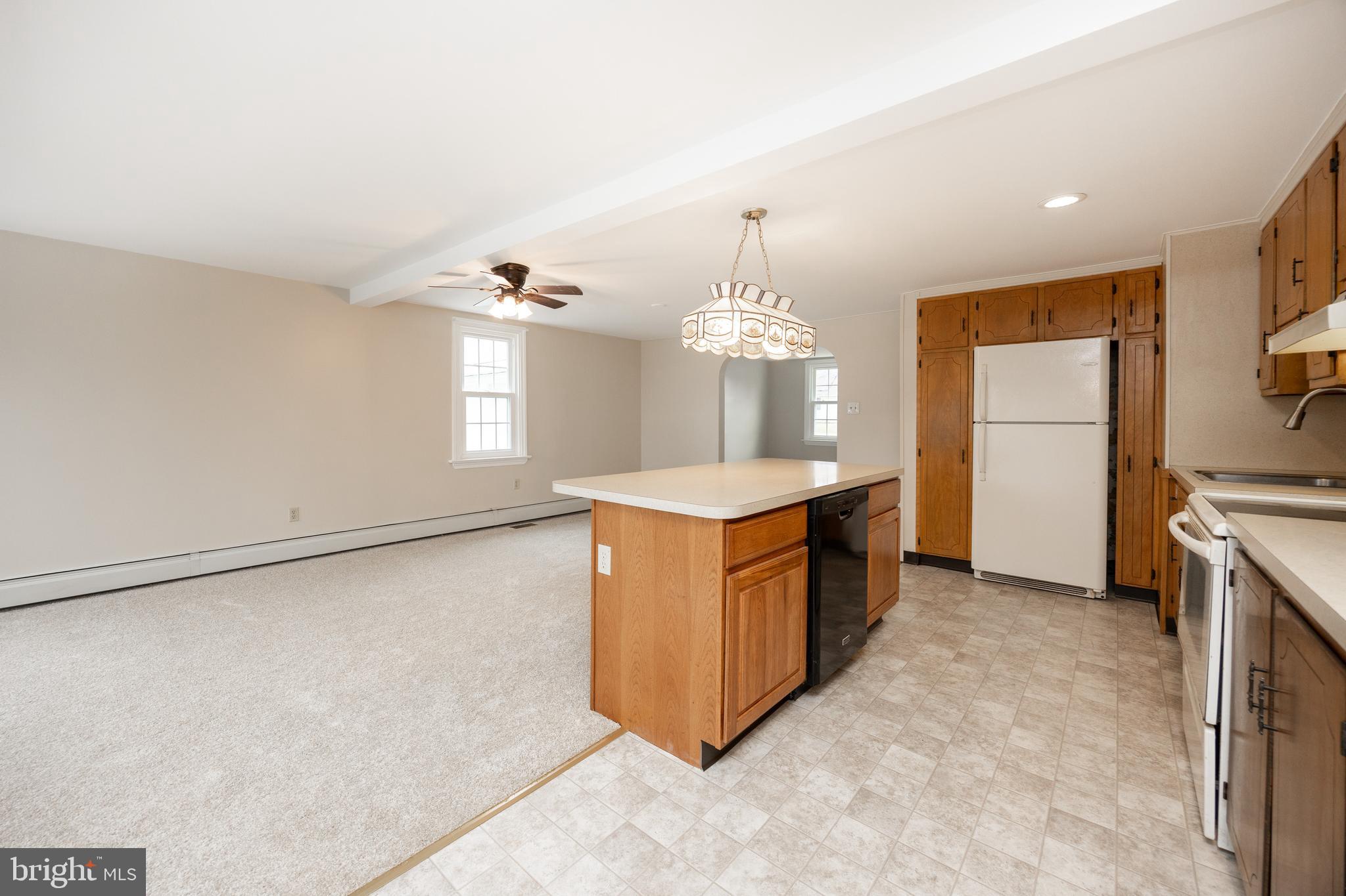 933 Forty Foot Road Hatfield, PA 19440 - Photo 3 of 28 a large kitchen with a sink stainless steel appliances and cabinets