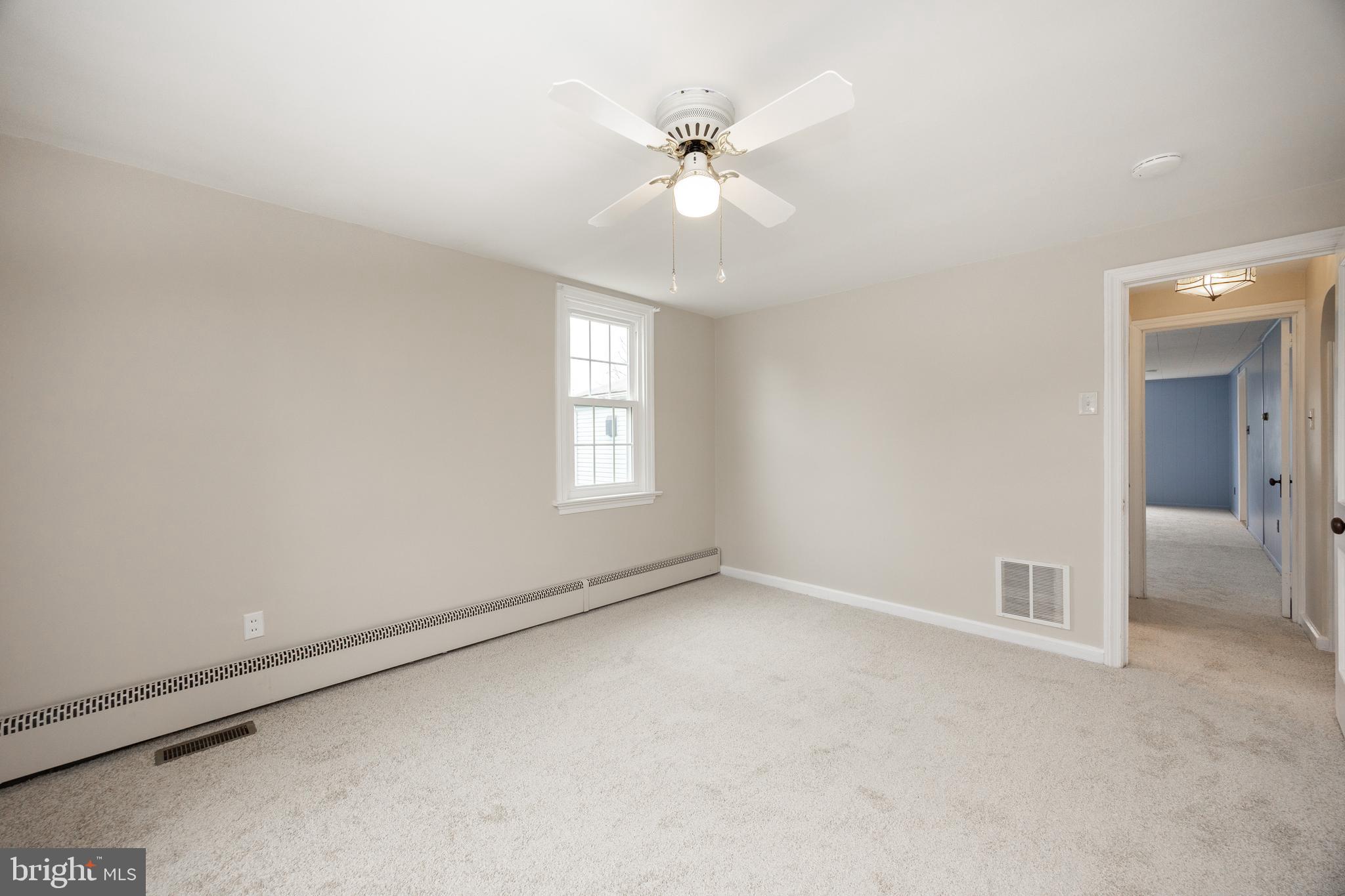 933 Forty Foot Road Hatfield, PA 19440 - Photo 9 of 28 wooden floor in an empty room with a window