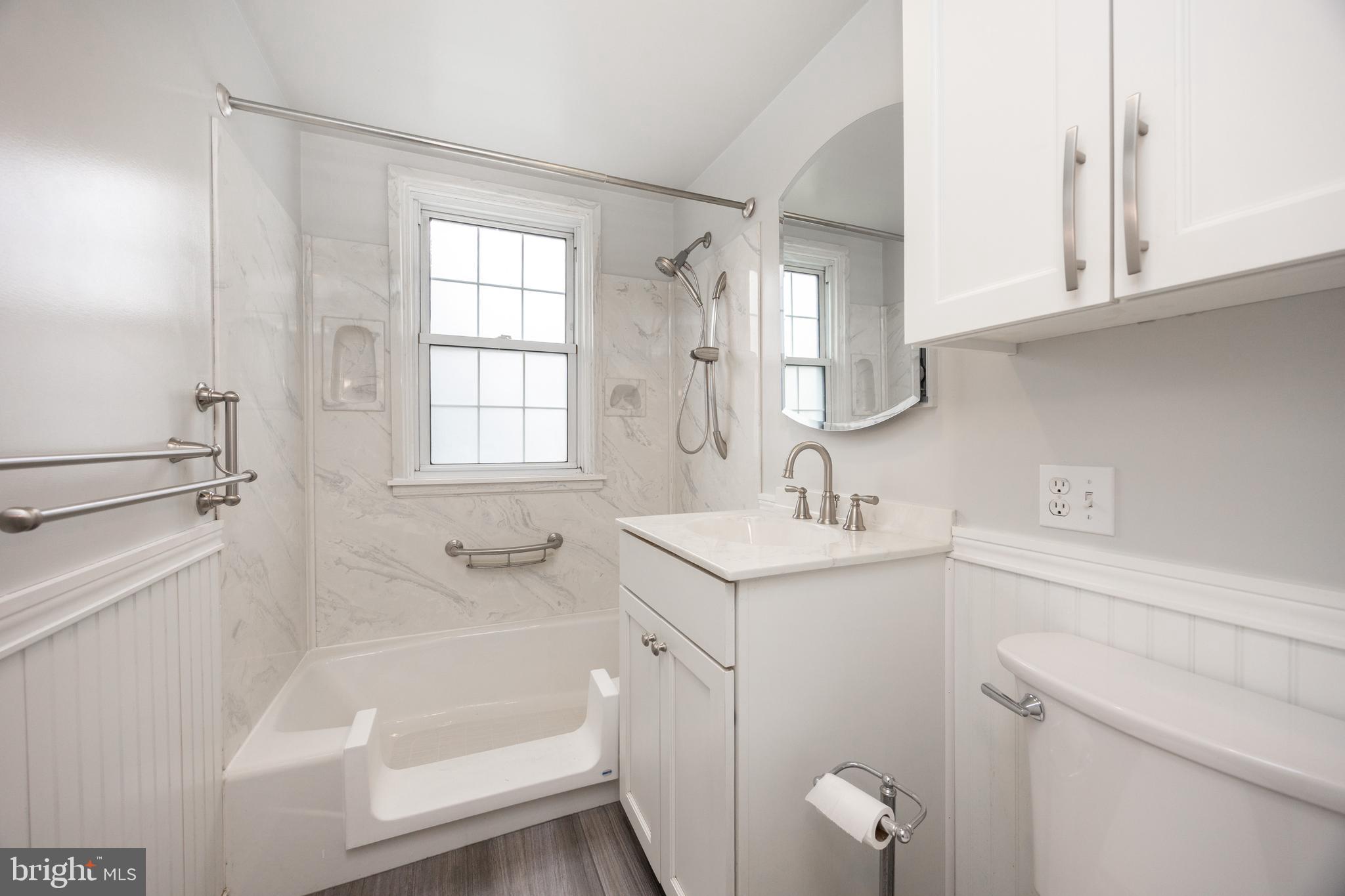 933 Forty Foot Road Hatfield, PA 19440 - Photo 10 of 28 a bathroom with a sink a toilet and bathtub